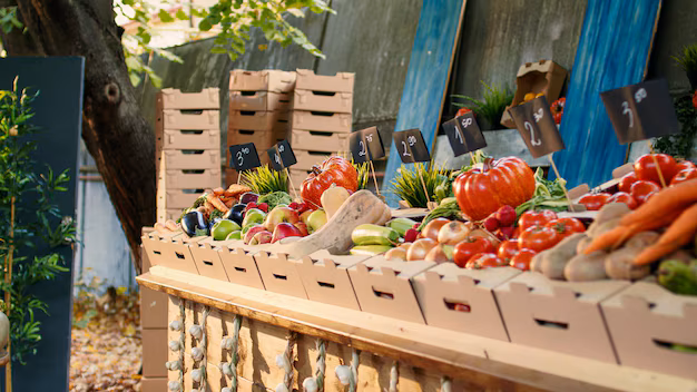 Fresh seasonal produce displayed at a local market stall